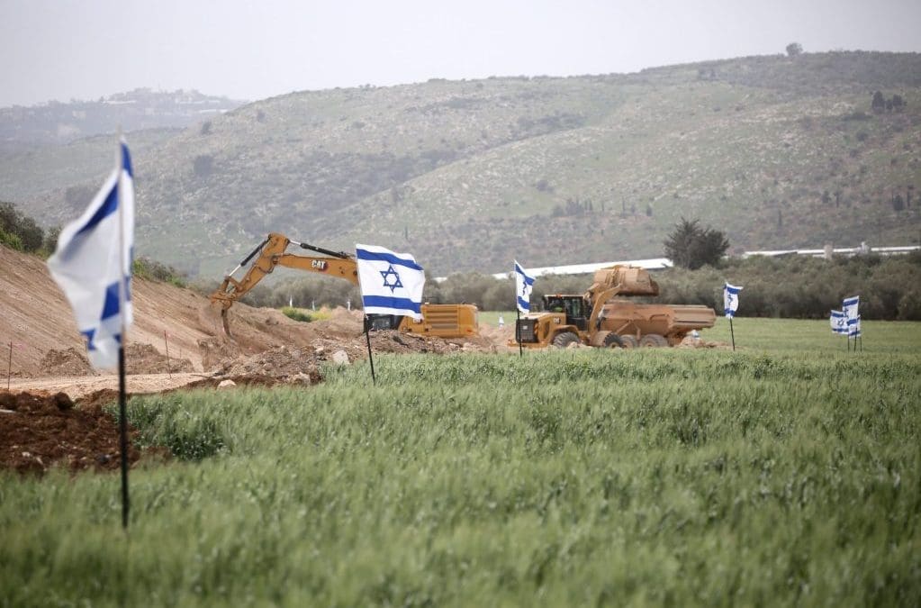 Israel is racing to expand West Bank settlements before new political realities end its era of impunity