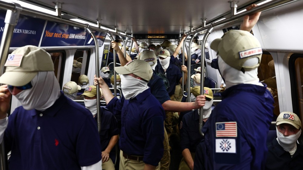 What the July 4 photo of a Black woman surrounded by white supremacists says about America